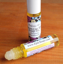 Load image into Gallery viewer, Perfume oil in a roll on bottle - 7ml - Choose a Scent from the Spring 2024 Collection